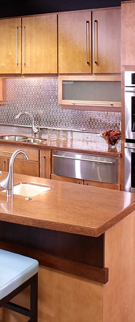 Kitchen with brown kitchen cabinets and a sink