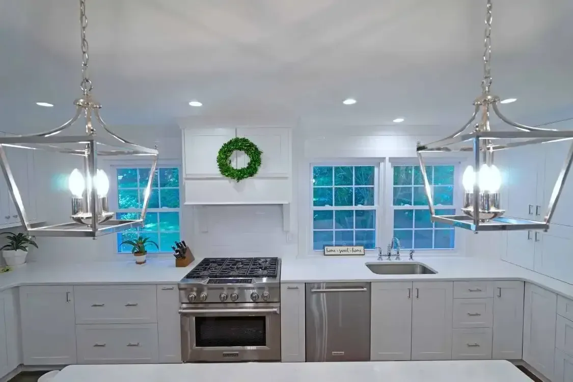 Vienna VA kitchen island with chrome lantern pendant lighting