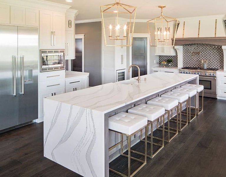 kitchen with white cabinets and marble counter tops