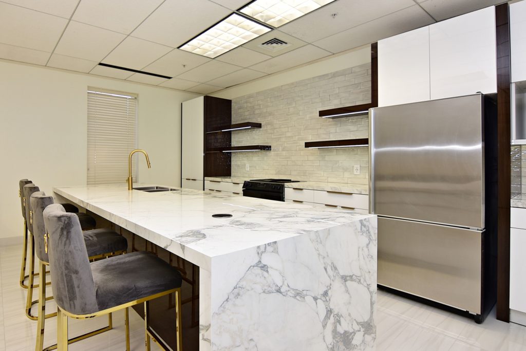 A modern kitchen with sleek marble countertops