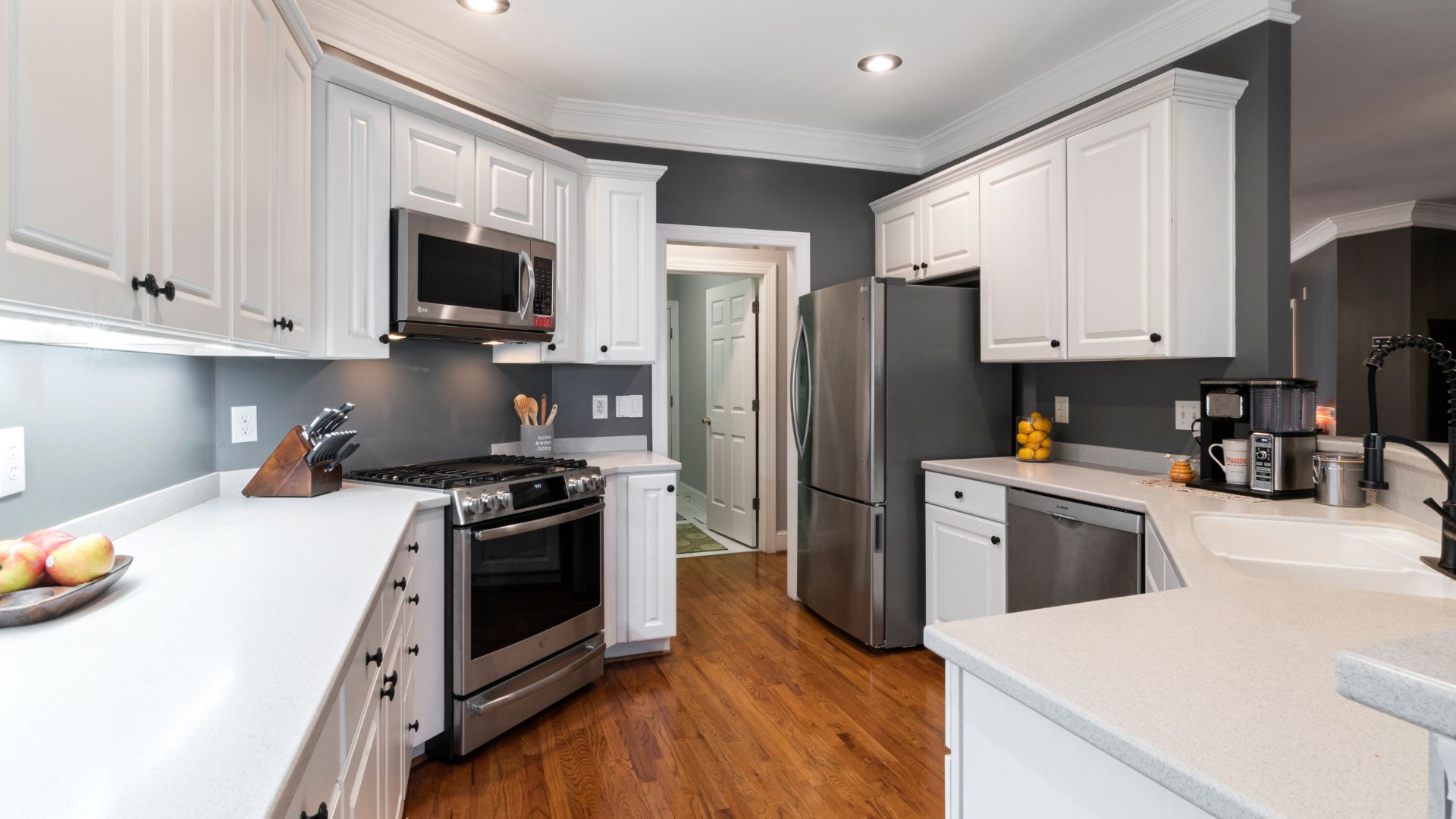 White kitchen cabinets with a beautiful sink