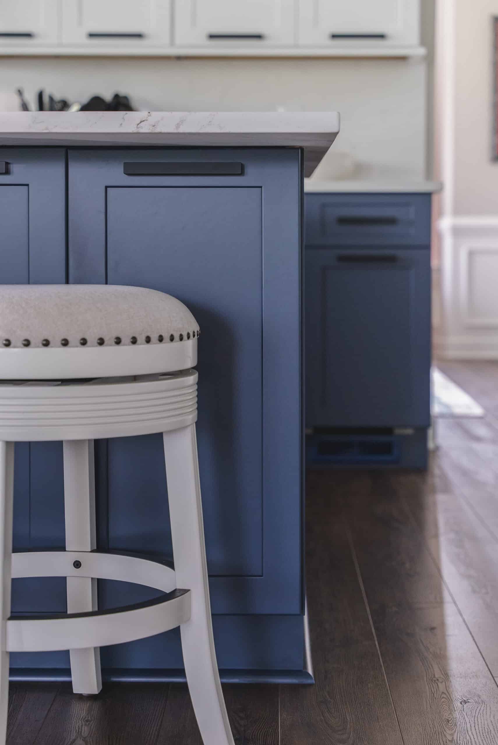 A Navy Blue Cabinet and a chair