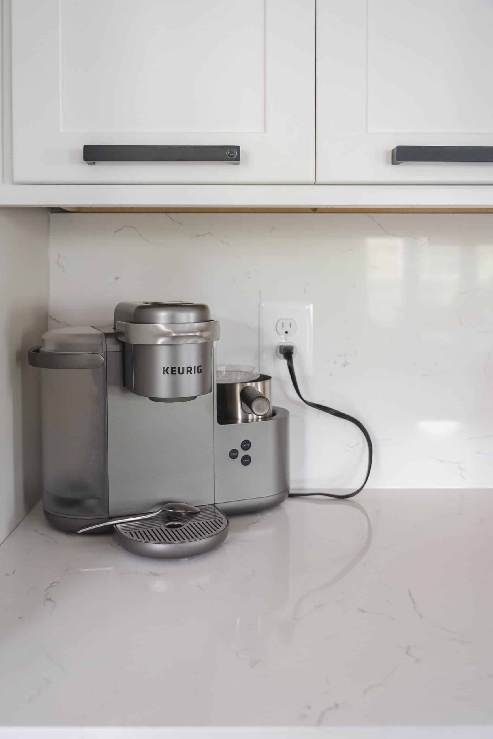 White Kitchen Cabinets and a Coffee Maker