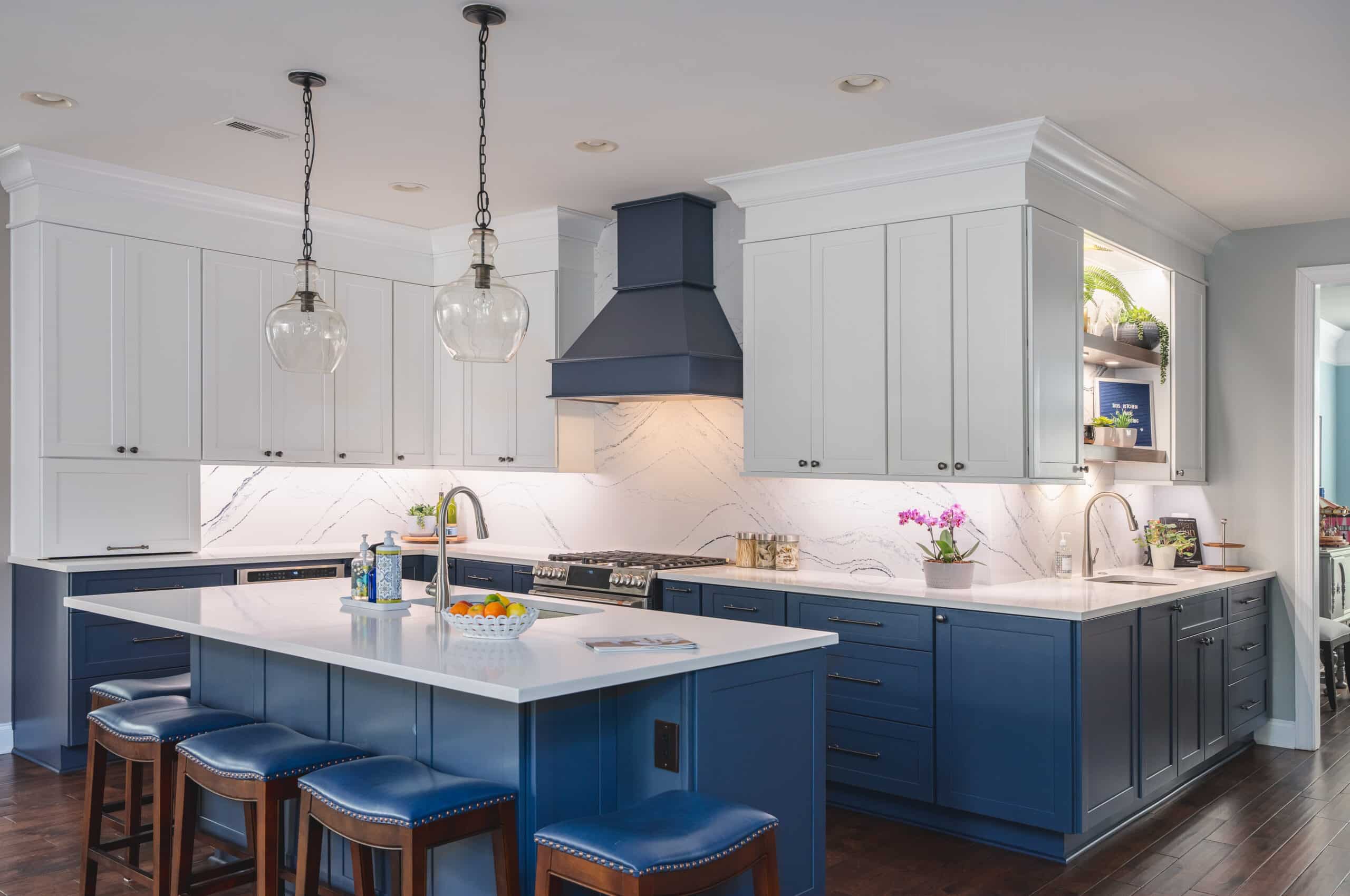 kitchen with blue cabinets and white countertops