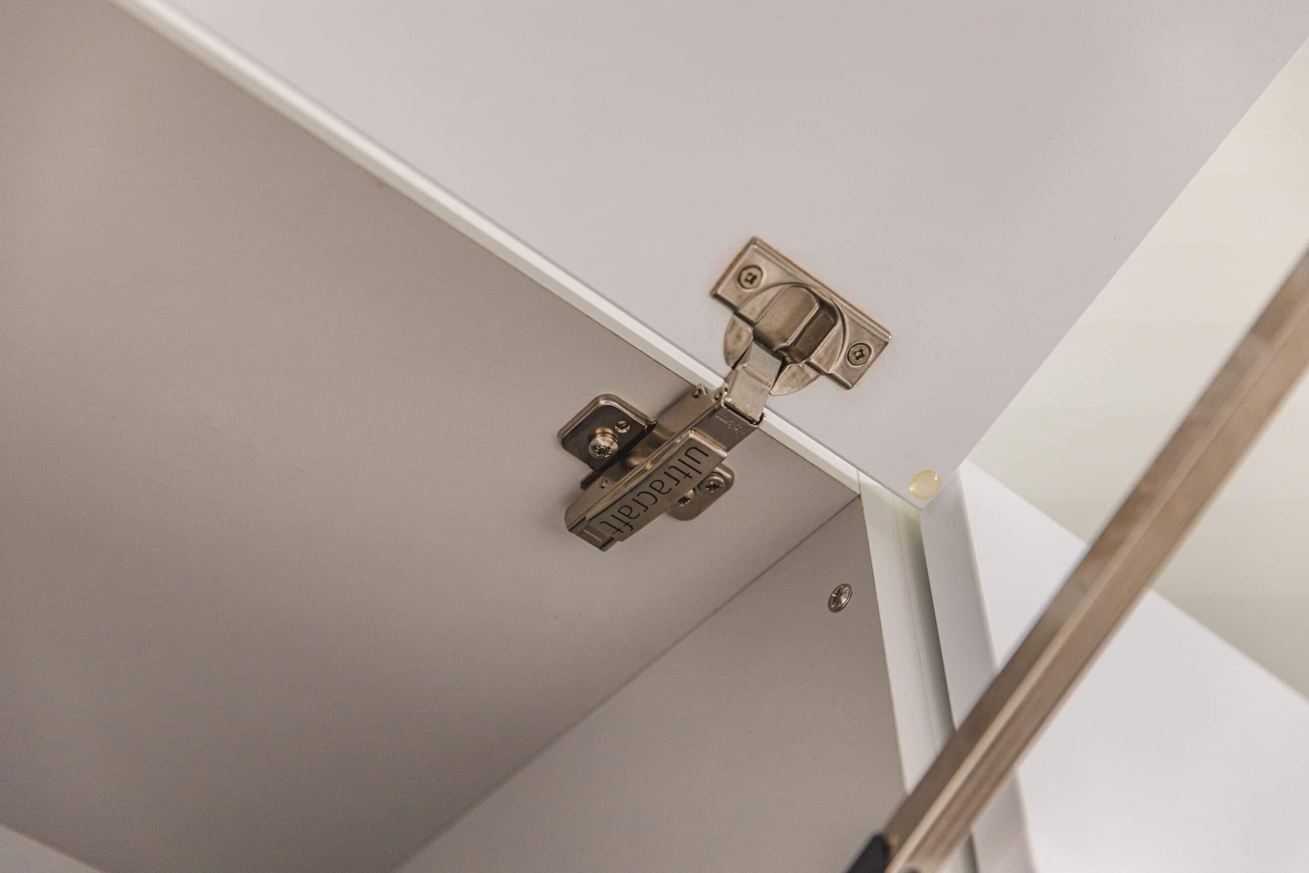 A white cabinet doors hinges