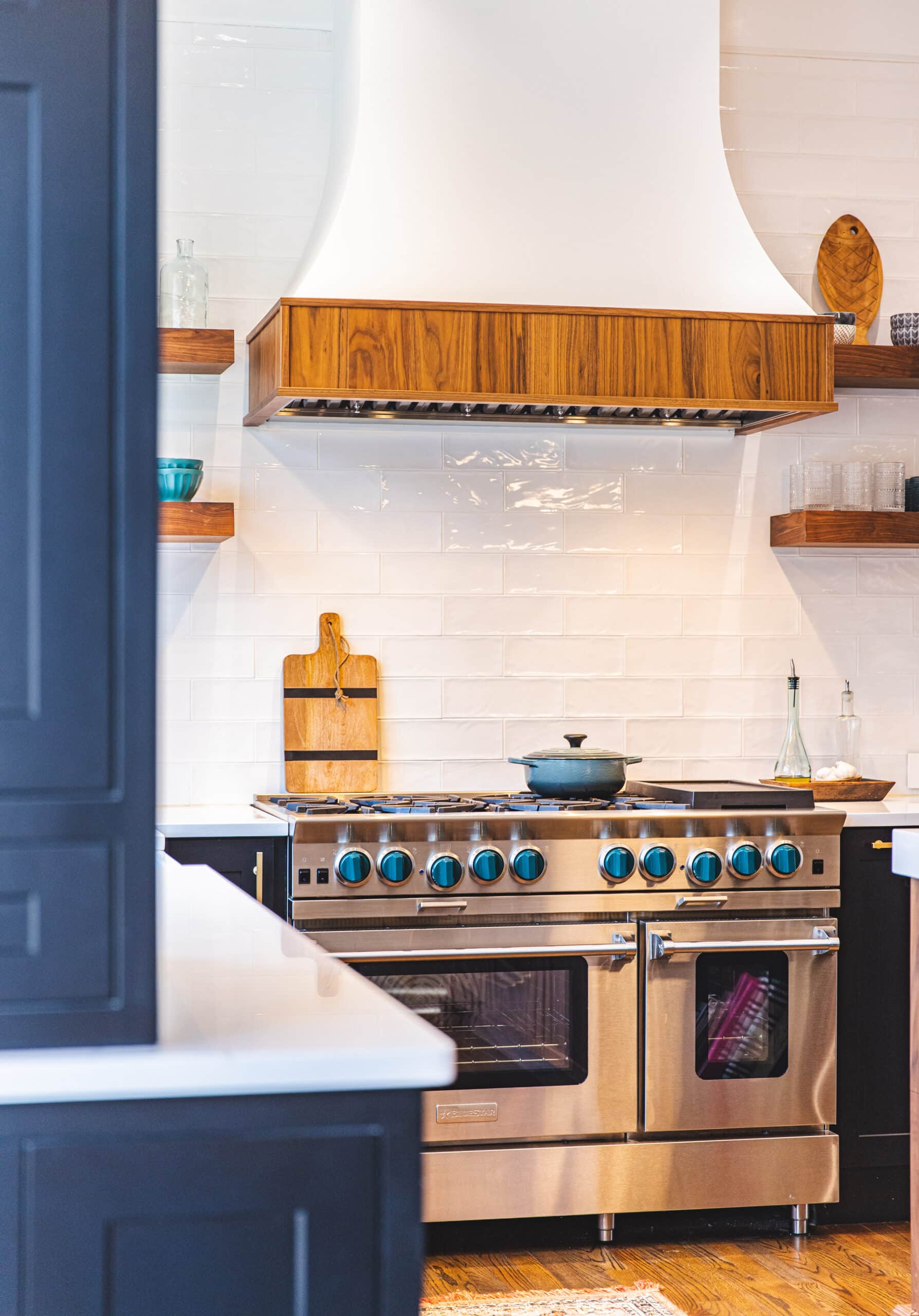 A well-equipped kitchen with a stove, oven, and cabinets