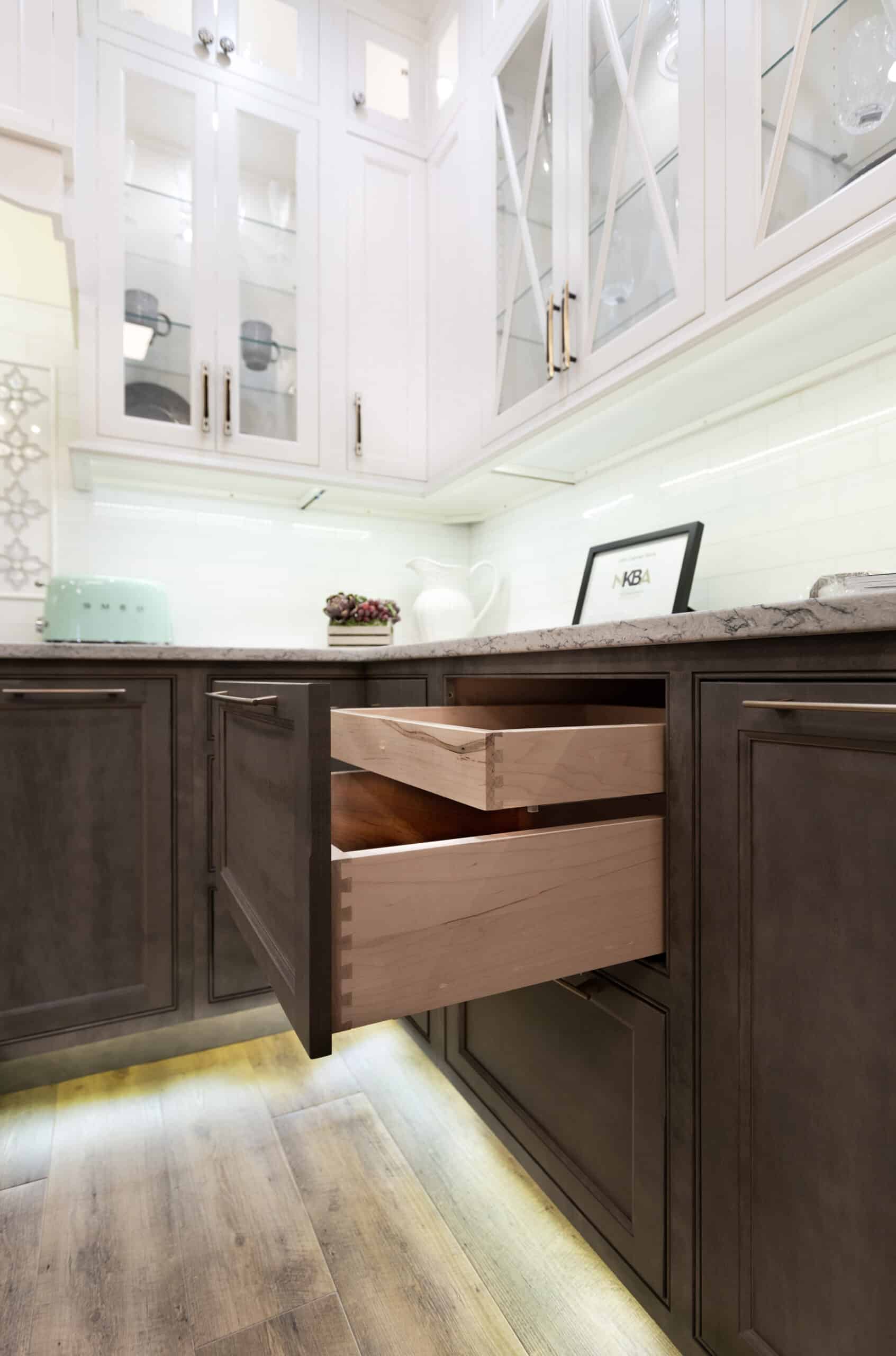 A well-lit kitchen with a convenient pull-out drawer