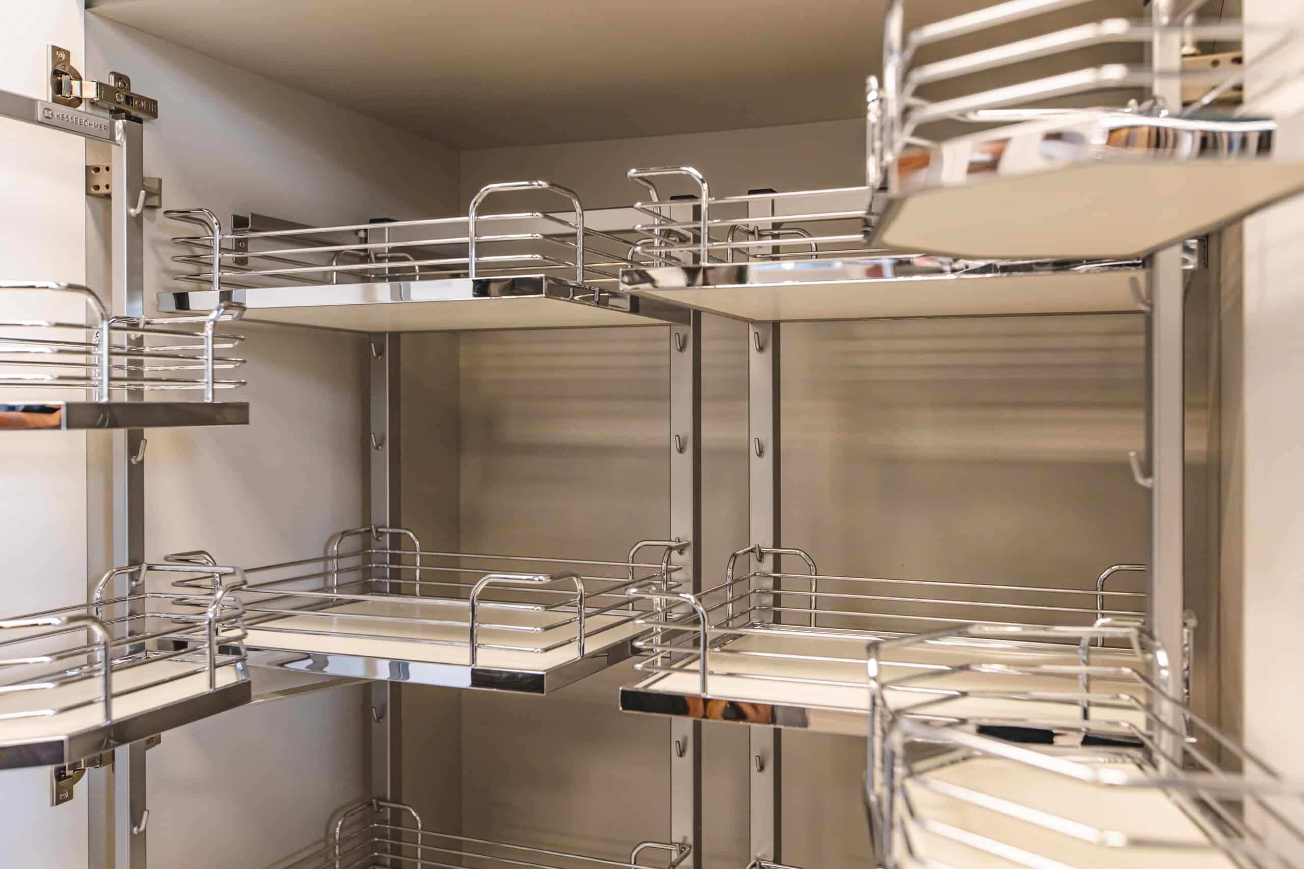 spacious kitchen pantry filled with shelves to accommodate various items