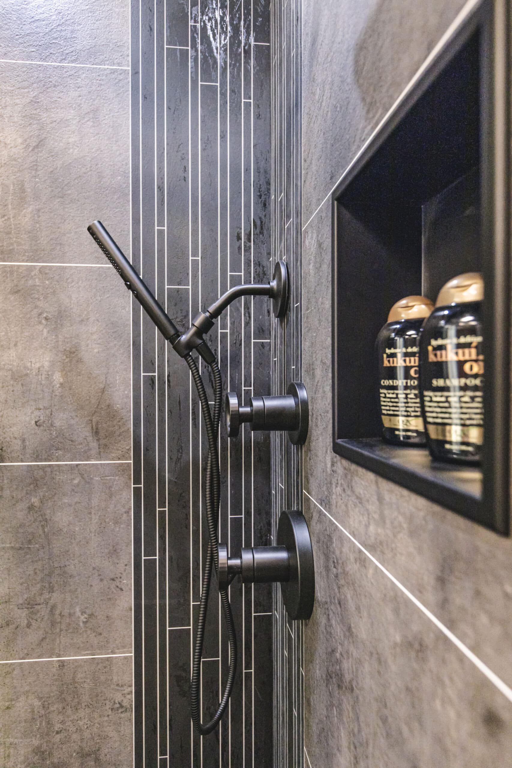 A monochrome tiled shower