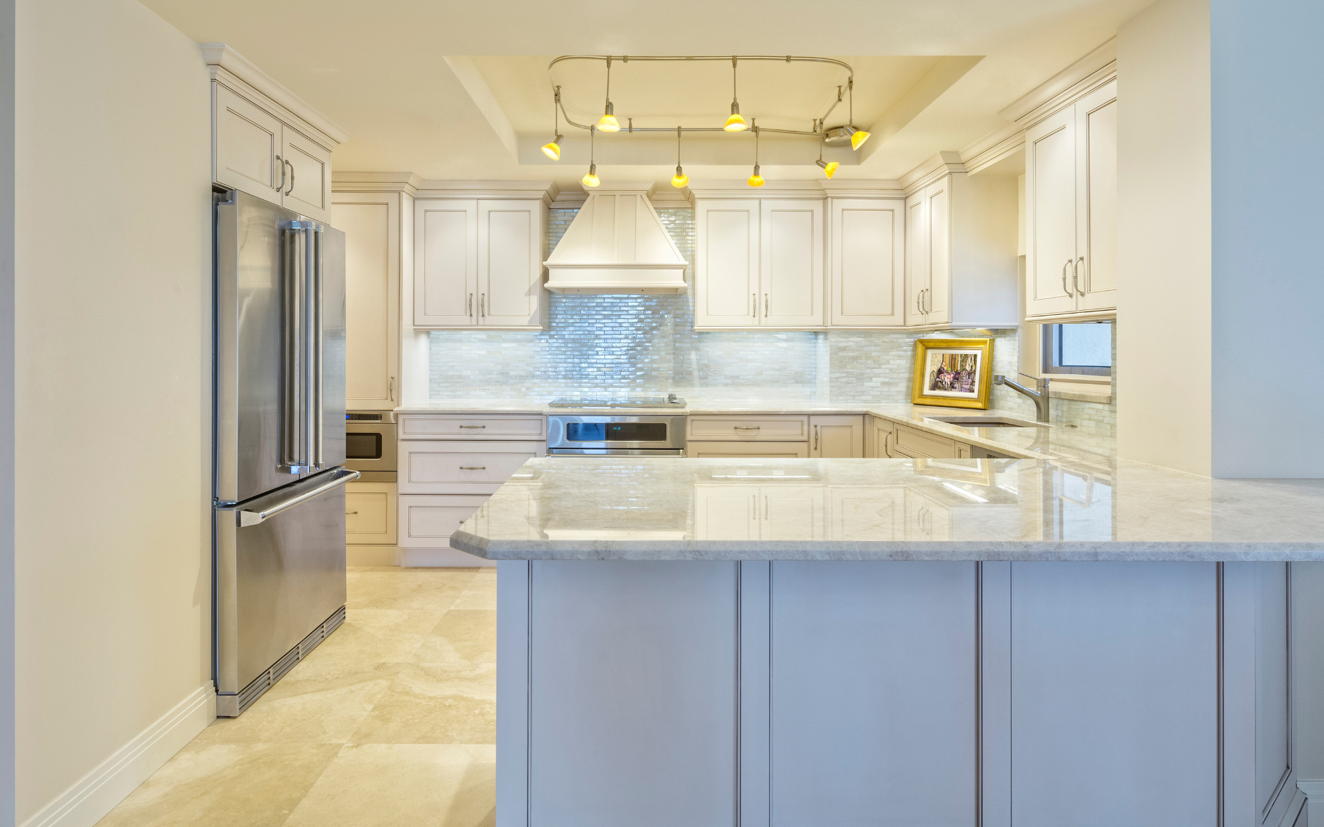 Classic & Traditional Kitchen Design 1 White kitchen cabinets and stainless steel refrigerator in modern kitchen