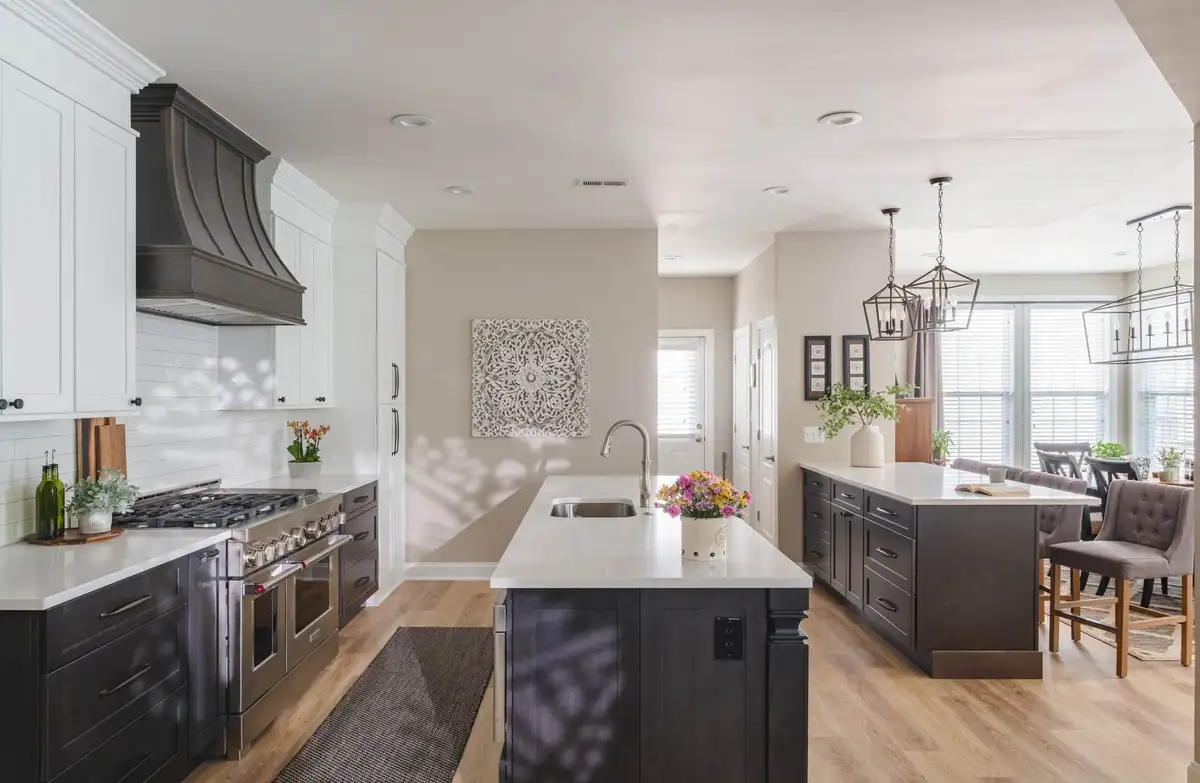 A Park Creek Kitchen with Dual Islands and Contrasting Cabinets