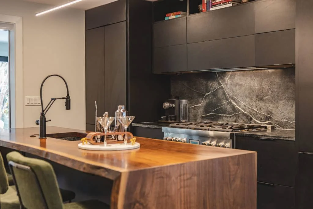 Black Showplace EVO cabinets with warm wood countertops in DC kitchen project