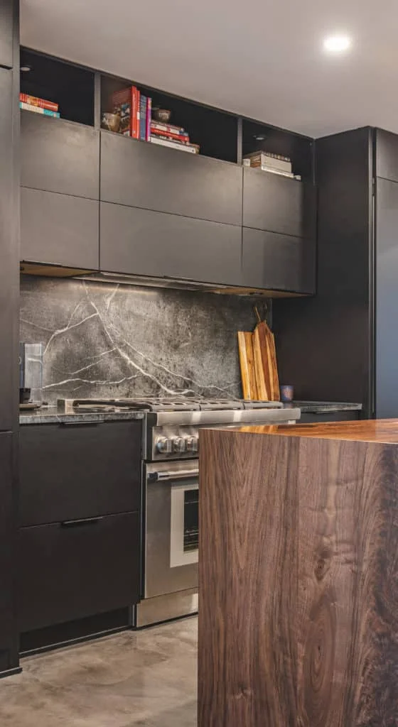 Sleek black Showplace EVO kitchen cabinets designed by Selman Kazanci in DC