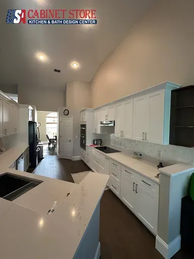 Kitchen Remodeling in Orlando: What to Expect (2026 Homeowner Guide) 9 Vaulted ceiling, all-white kitchen, peninsula