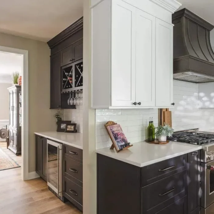 Park Creek Miyuki transitional kitchen with dark wood cabinetry and custom range hood